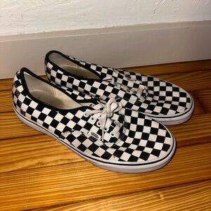 Vans Black and White Checkerboard Slip-On Sneakers